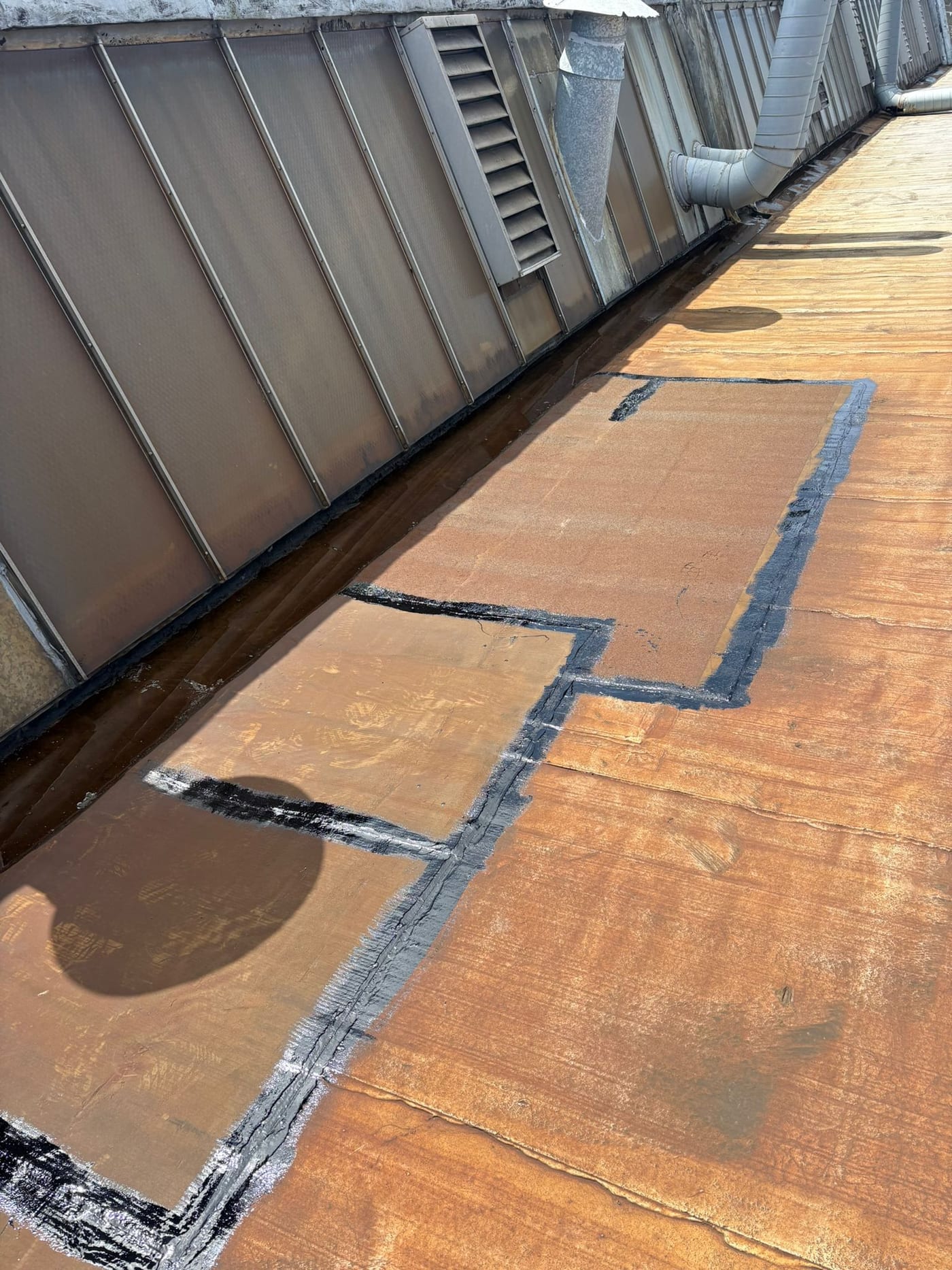Commercial roof sealing of seams and joints on a flat industrial roof in Limerick