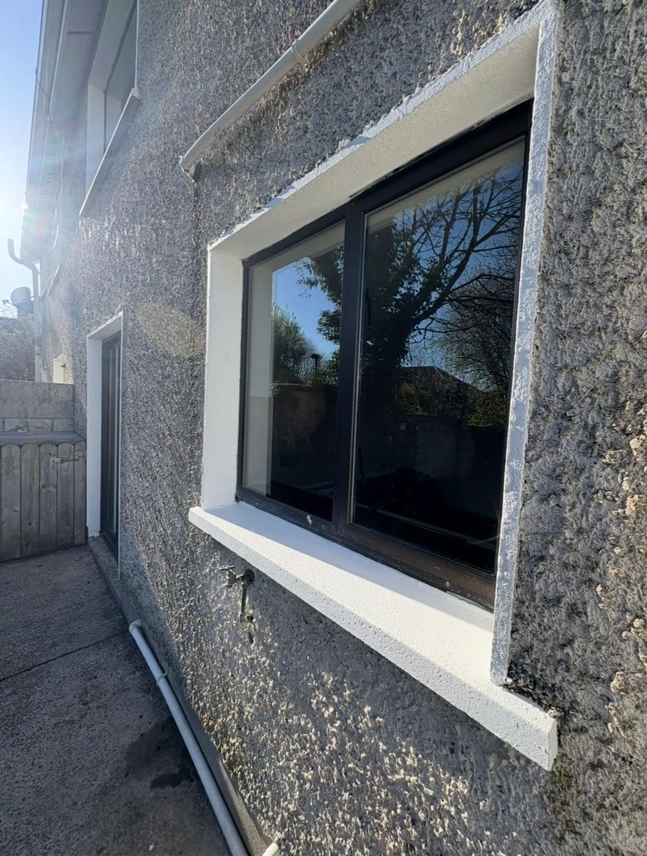 Freshly painted exterior window surrounds on a residential property in Limerick