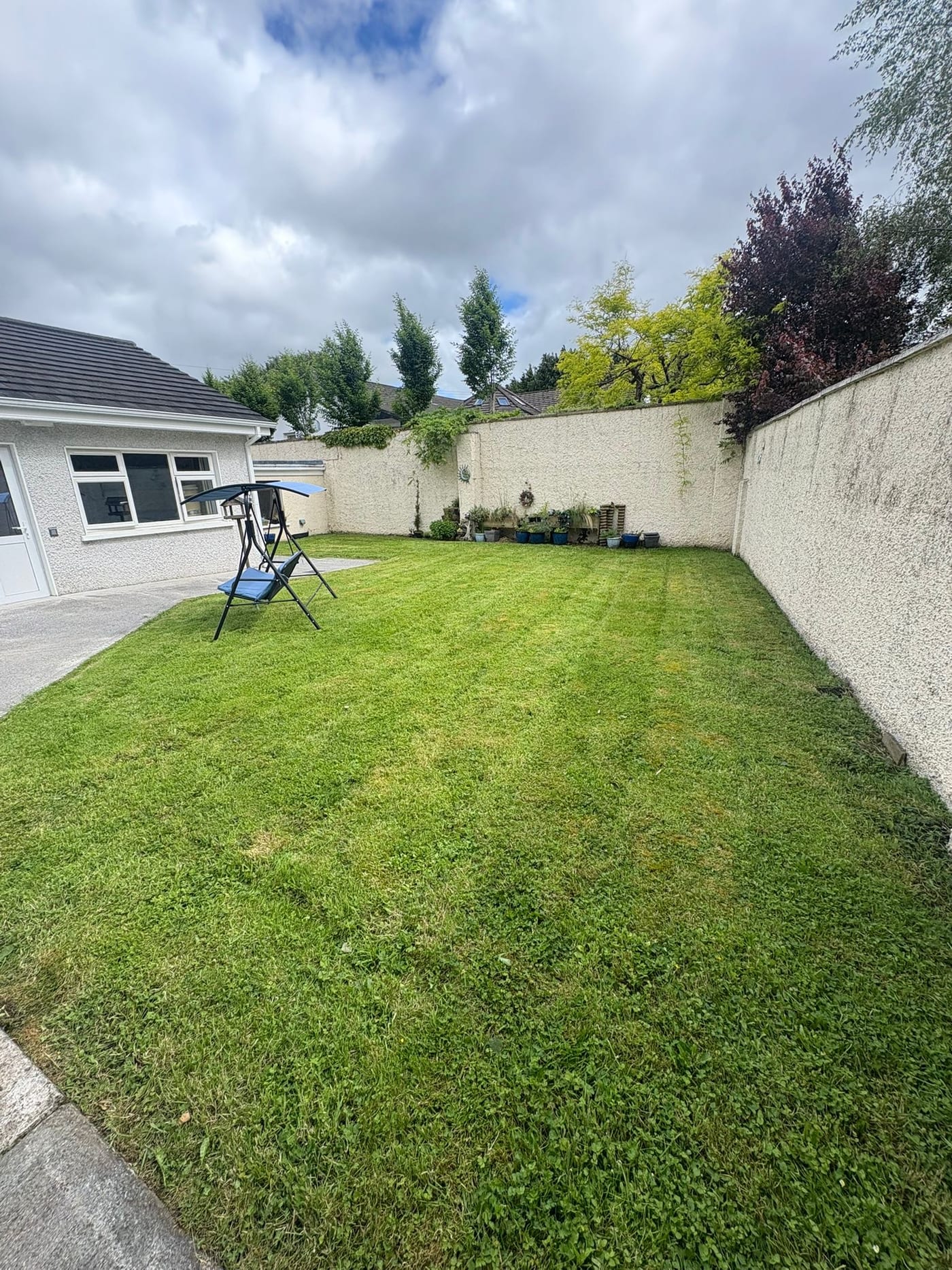 Freshly cut residential lawn maintained by Podge Power Maintenance in County Limerick