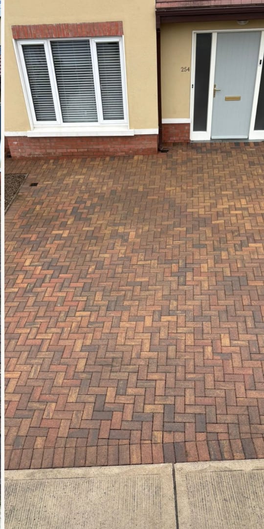 The same driveway after power washing in Limerick — clean, bright block paving